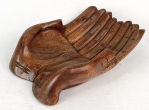 Hand carved wooden bowl. Pair of cupped hands. Offering assistance.
