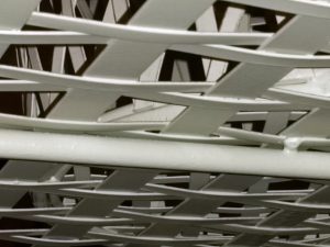 Underneath The Lattice Work. Shows Table & Baskets.