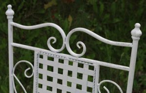 white-fret-metal-folding-chair-close-up-fretwork