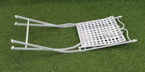 white-fret-metal-folding-chair-folded-up