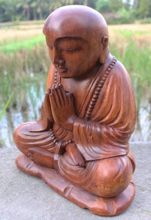 30cm sitting praying monk buddha. dark finish