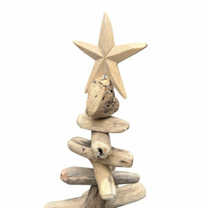 Beautiful hand carved star tops these driftwood trees