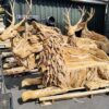 handmade teak lion bench seat made from driftwood